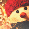 Снеговик в красной шапке