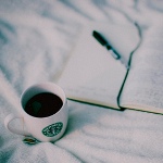 Starbucks coffee, книга и ручка
