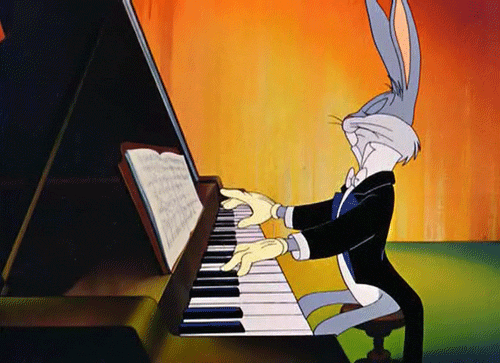 Заяц пианист играет на рояле. Ушастый маэстро торжественн...